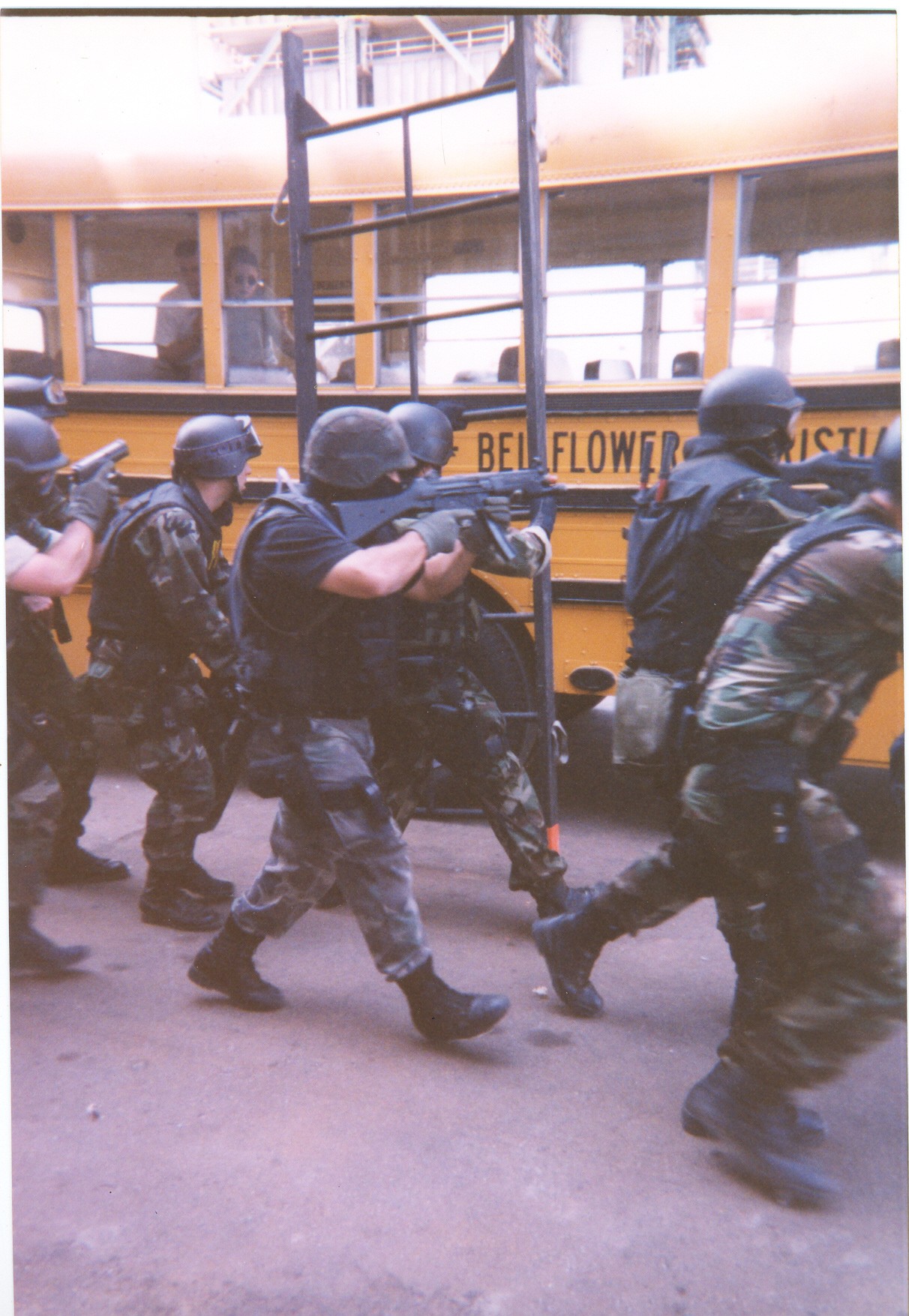30+ years Jim has trained SWAT teams (like the one in the photo in Jim's Bus Assault course), military units,  private security companies firearms course.