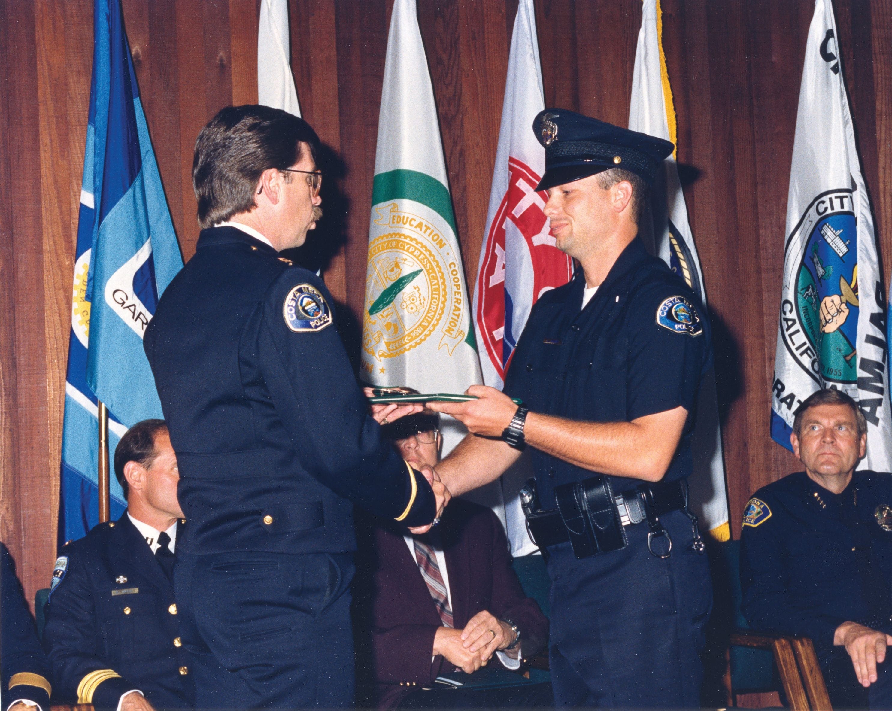It's important that you have an instructor who went through the police academy. Jim (right) graduating here after 5 months of training in 1991.