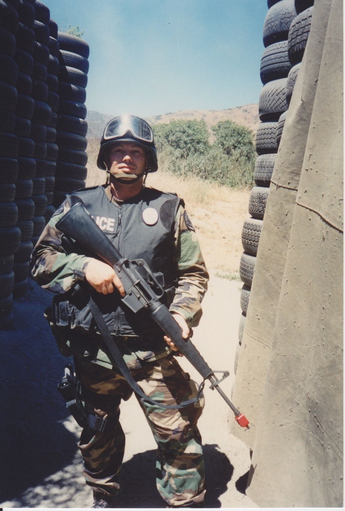 Jim was a SWAT officer with his police department for three years. In this photo he is at a shoot house for live-fire AR-15 rifle training.