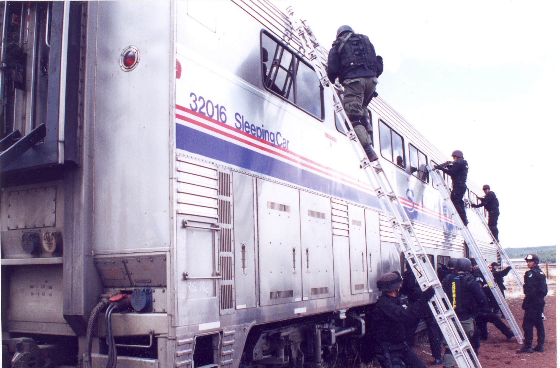 Jim's FBI, US Army, and various law enforcement agencies students, run through a train assault scenario that he set up for them after teaching techniques.