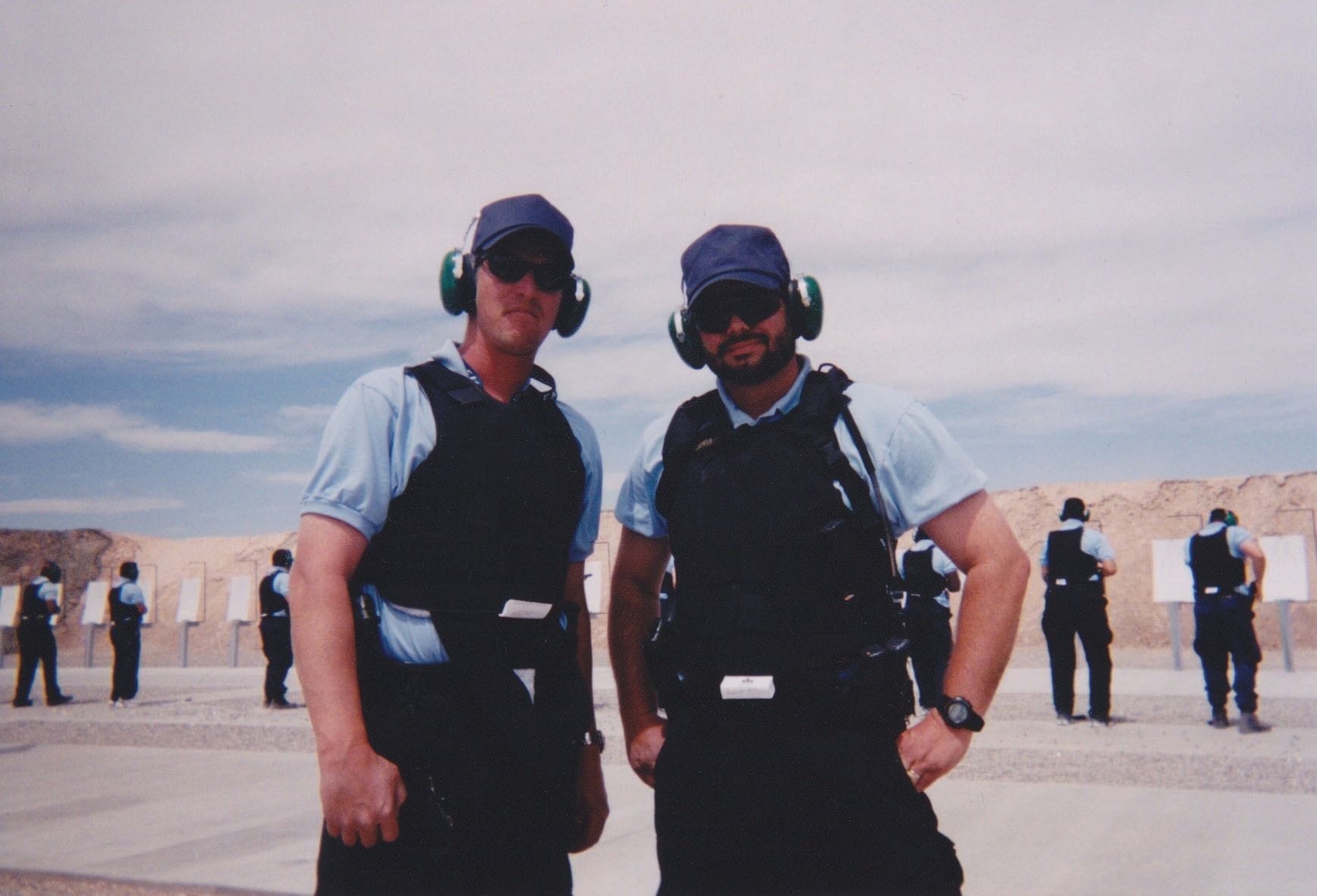 Jim (right) at the Federal Law Enforcement Training Center (FLETC) in New Mexico on a live-fire range training to be a U.S. federal counterterrorist agent.