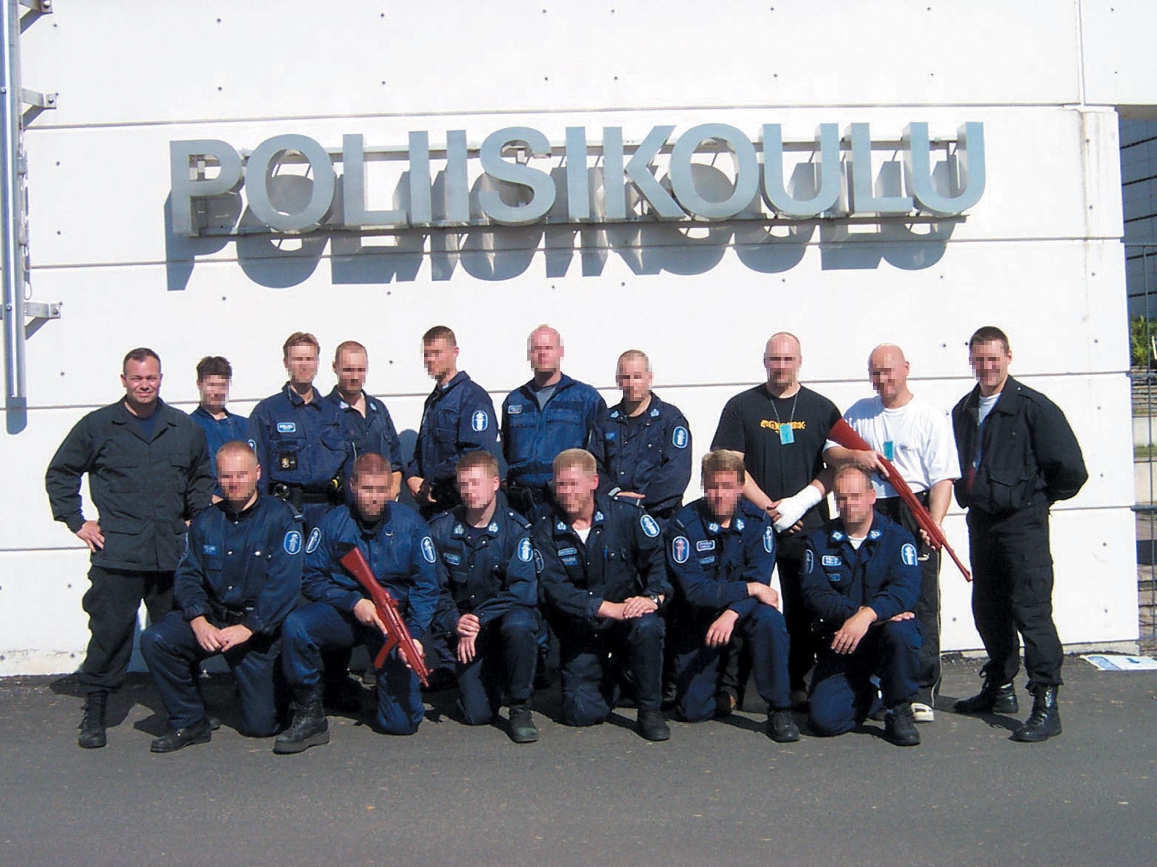 Jim (left) with his students, the instructor cadre of the Finnish National Police Academy (POLIISIKOULU) in Tampere, Finland. He taught several courses there.