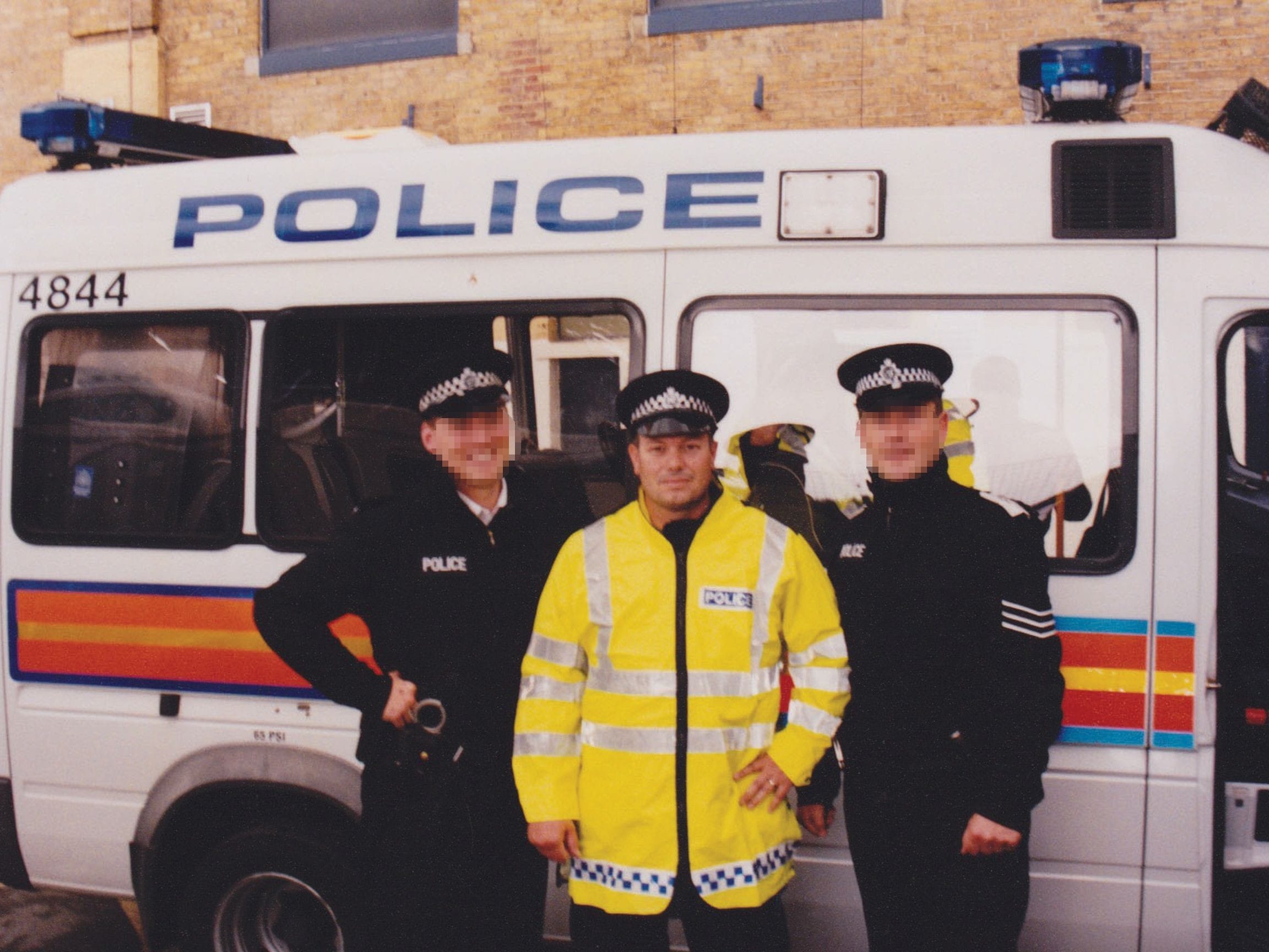 Jim (center) was actually a London Metropolitan TSG (Riot Police) constable for a day during an actual riot. It's a long story...