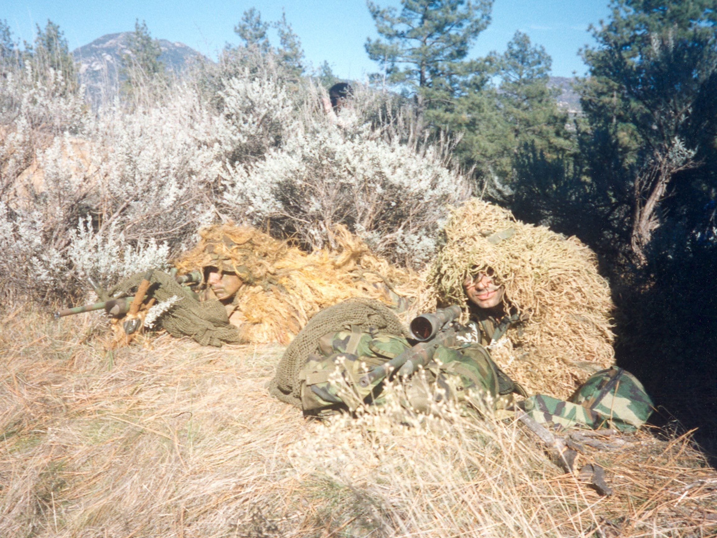 Jim's job on the team required that he be trained as a scout/sniper for intelligence gathering purposes. Jim (right) is shown here during sniper training.